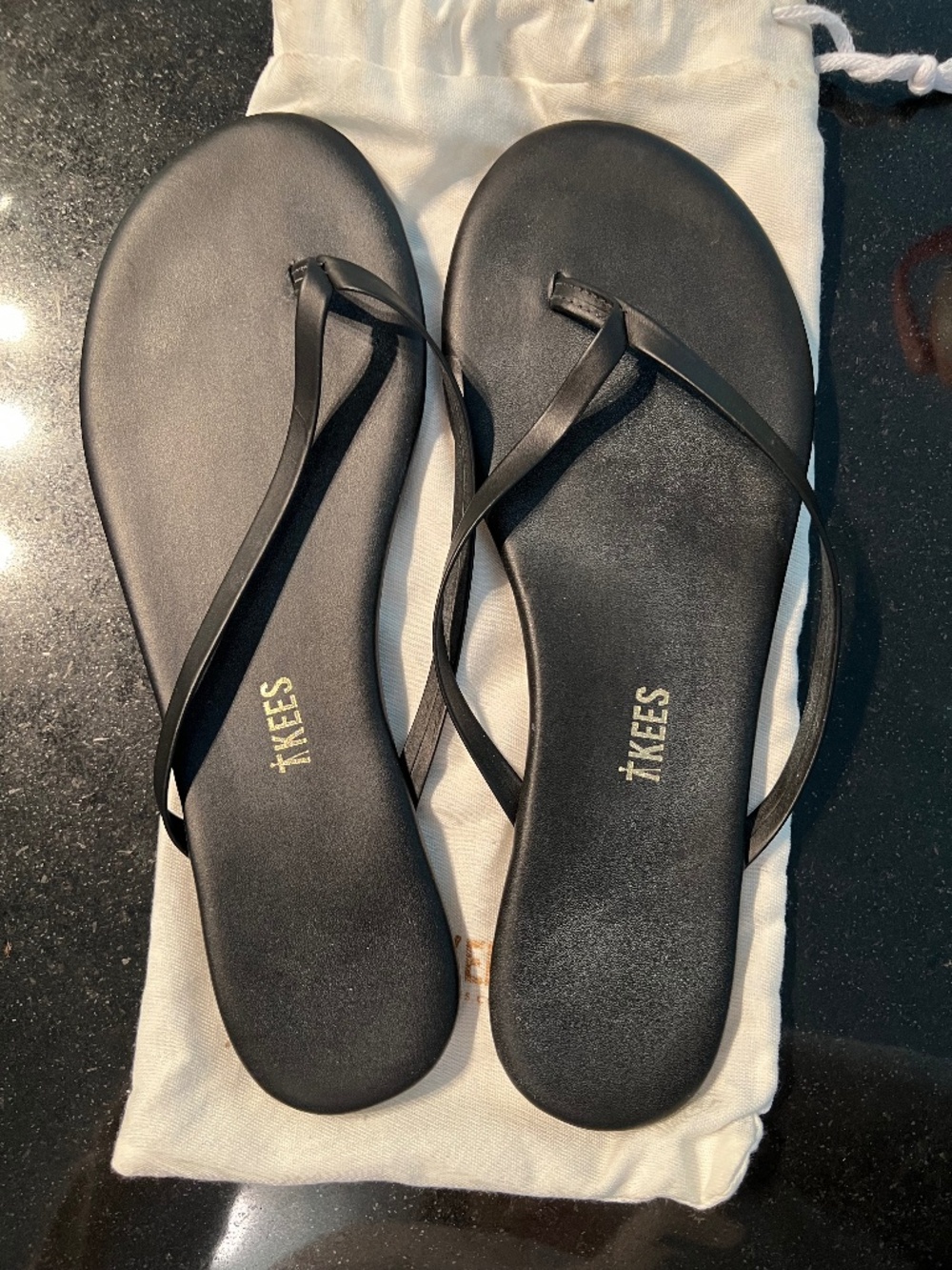 Black Tkees Flip Flops - size 8